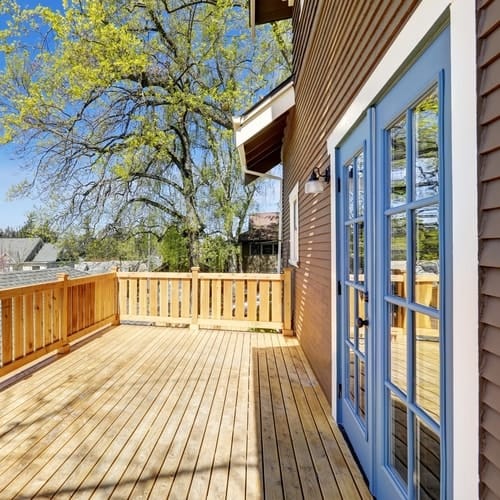 The Best Deck Stain Colors for Blue Houses